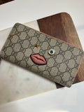 Gucci GG Supreme Monogram Face Zip Around Wallet